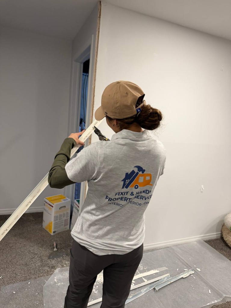 Wall prep or patching in a finished home interior.
